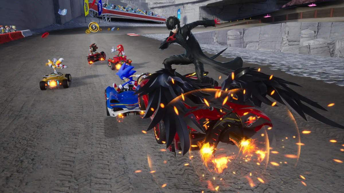 Záběr z hraní Sonic Racing: CrossWorlds, ve kterém Sonic a další crossoverové postavy závodí v autech.